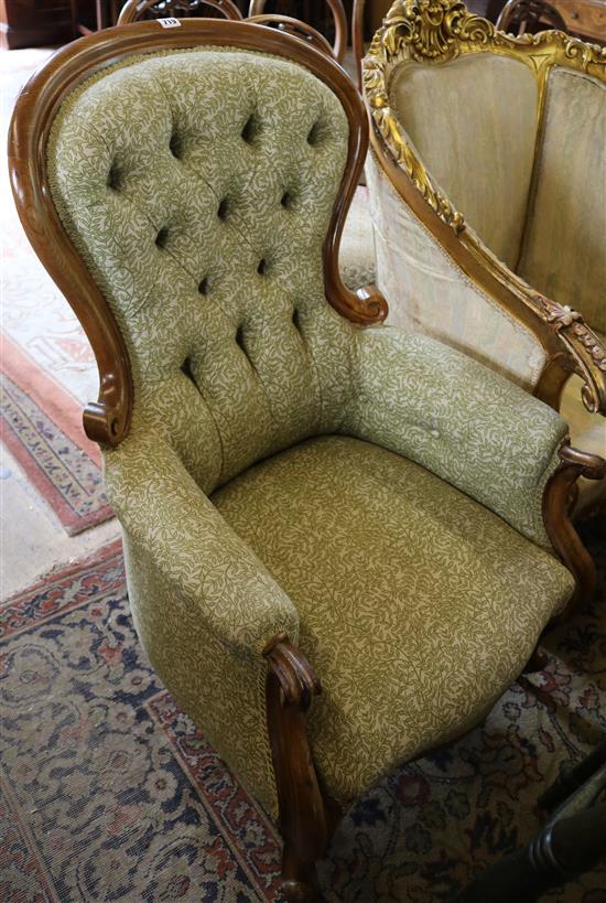 A Victorian buttoned back armchair